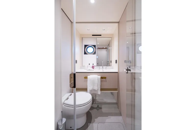 Euphoria Yacht Photos Pics Luxurious bathroom in 2022 Azimut 78 yacht, featuring modern fixtures and elegant design.