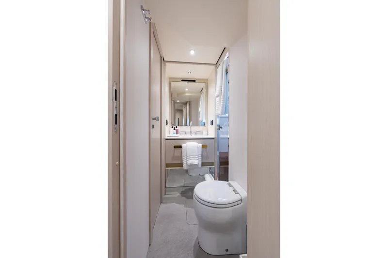 Euphoria Yacht Photos Pics Luxurious bathroom interior of 2022 Azimut 78 yacht, featuring modern fixtures and elegant design.