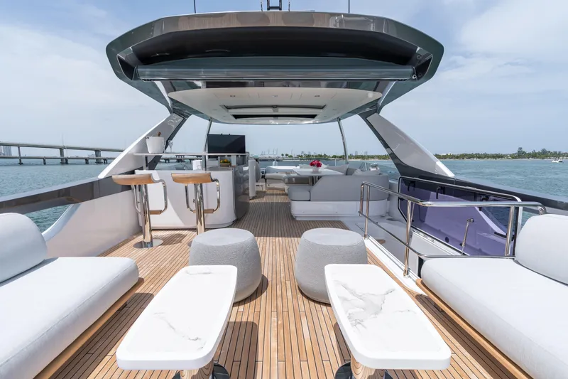Euphoria Yacht Photos Pics Luxurious 2022 Azimut 78 yacht deck with modern seating and ocean view.