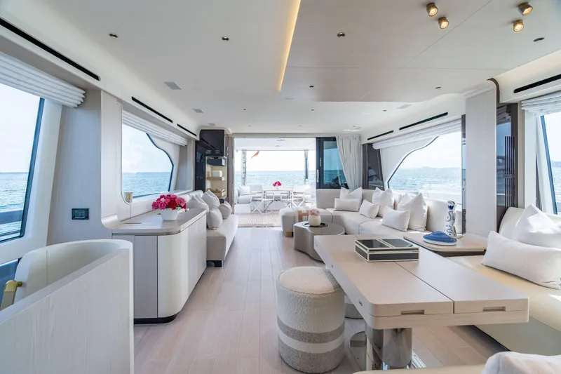 Euphoria Yacht Photos Pics Luxurious interior of 2022 Azimut 78 yacht with elegant furnishings and ocean view.