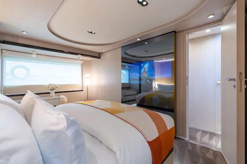 Euphoria Yacht Photos Pics Luxurious bedroom interior of 2022 Azimut 78 yacht, featuring modern design and elegant decor.