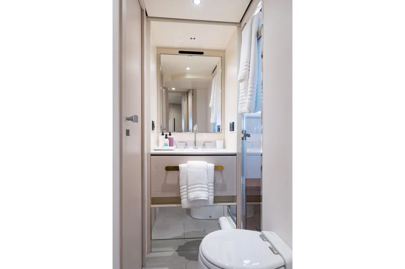 Euphoria Yacht Photos Pics Luxurious bathroom interior of 2022 Azimut 78 yacht with modern fixtures and elegant design.