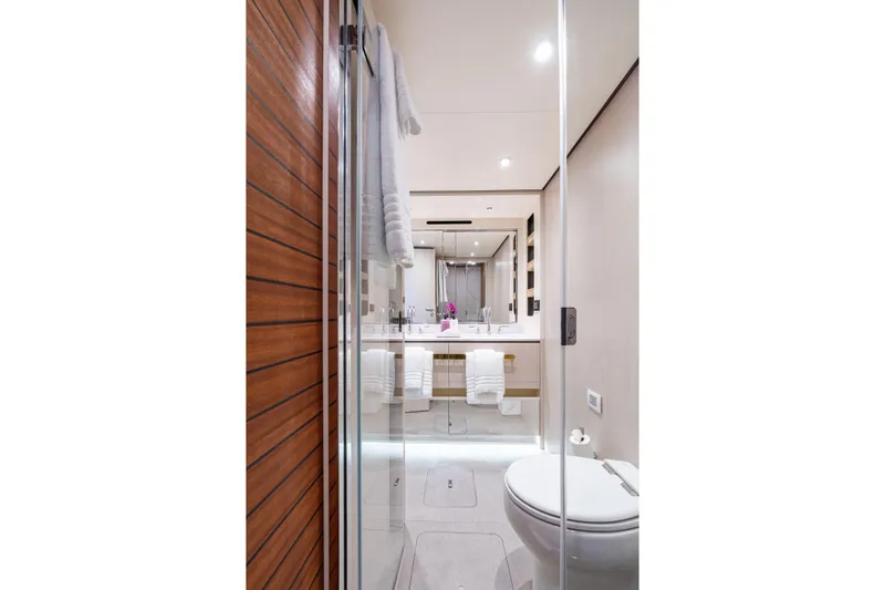 Euphoria Yacht Photos Pics Luxurious bathroom interior of 2022 Azimut 78 yacht with modern fixtures and elegant design.