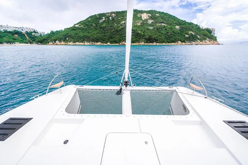 Tanna 47 In Toronto, On #251 Yacht Photos Pics Front deck of 2024 Fountaine Pajot Tanna 47 catamaran with scenic island view.