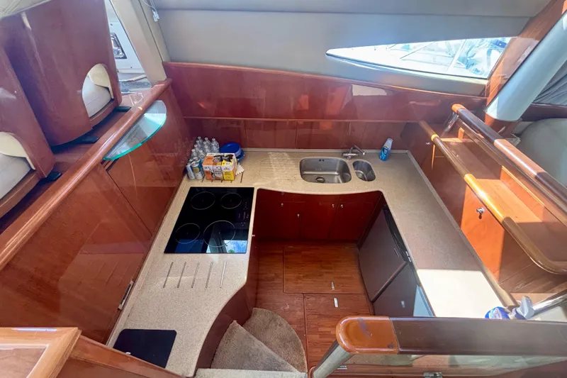  Yacht Photos Pics Luxurious kitchen interior of 2004 Viking Princess 61 Fly Bridge yacht.