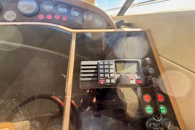  Yacht Photos Pics Control panel of 2004 Viking Princess 61 Fly Bridge yacht with radio and gauges.