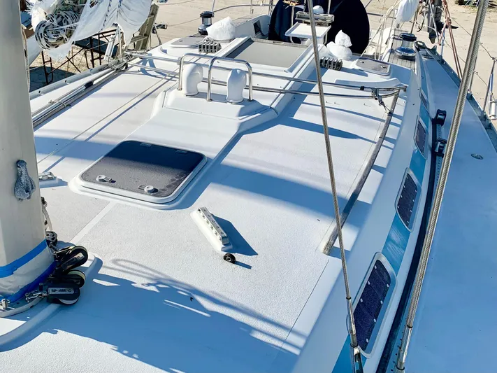 Cavallino Yacht Photos Pics Deck of 2000 Grand Soleil 46.3 sailboat, featuring sleek design and modern fittings.