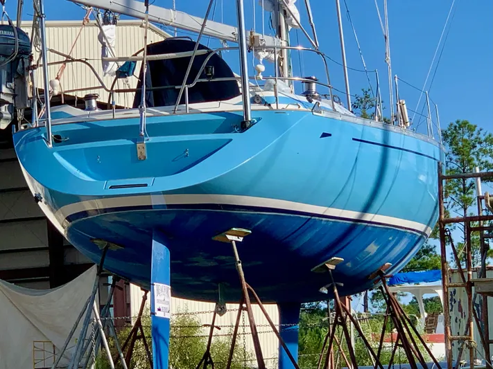 Cavallino Yacht Photos Pics Blue Grand Soleil 46.3 sailboat from 2000 on dry dock, supported by stands.