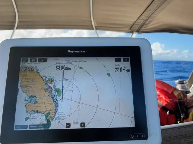  Yacht Photos Pics Navigation display on Jeanneau Sun Odyssey 51, showing 8.0 knots speed, ocean view in background.