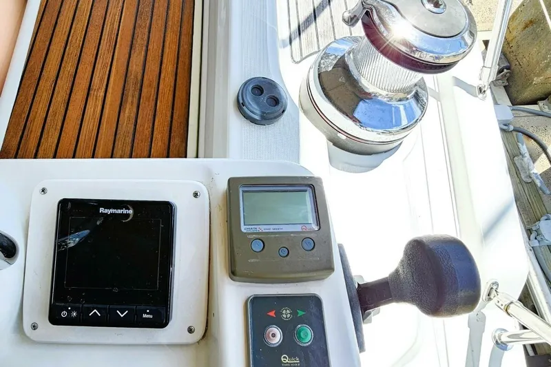 Yacht Photos Pics Control panel of 2017 Jeanneau Sun Odyssey 51 sailboat with Raymarine display and winch.