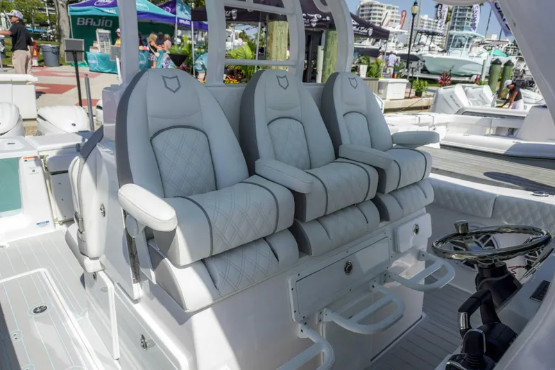 The Reel Commander Yacht Photos Pics 2026 Sea Fox 368 Commander boat with luxurious seating and modern helm design.