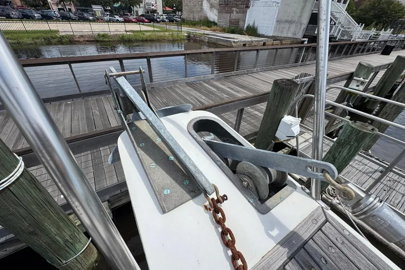 Carolina Breeze Yacht Photos Pics Anchor and chain on 1989 Grand Banks 42 Motor Yacht docked at marina.