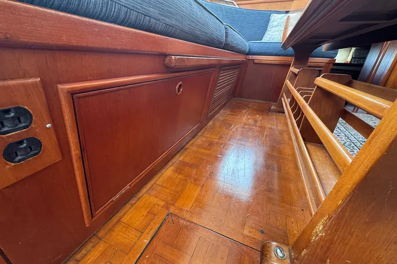 Carolina Breeze Yacht Photos Pics Interior of 1989 Grand Banks 42 Motor Yacht with wooden flooring and seating.