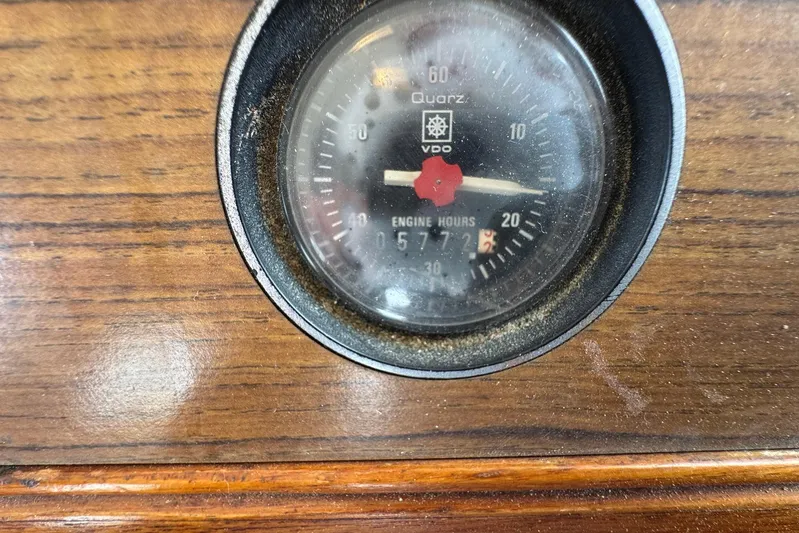 Carolina Breeze Yacht Photos Pics Analog engine hour meter on 1989 Grand Banks 42 Motor Yacht dashboard.