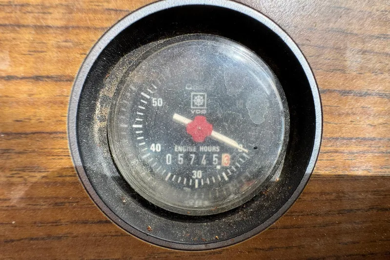 Carolina Breeze Yacht Photos Pics Analog engine hour meter on 1989 Grand Banks 42 Motor Yacht dashboard.