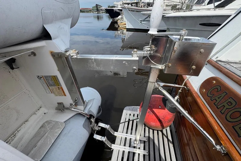 Carolina Breeze Yacht Photos Pics 1989 Grand Banks 42 Motor Yacht stern with dinghy mount and dock view.