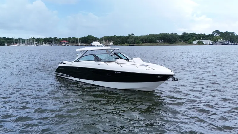  Yacht Photos Pics 2015 Cobalt A40 boat on calm water with scenic background.