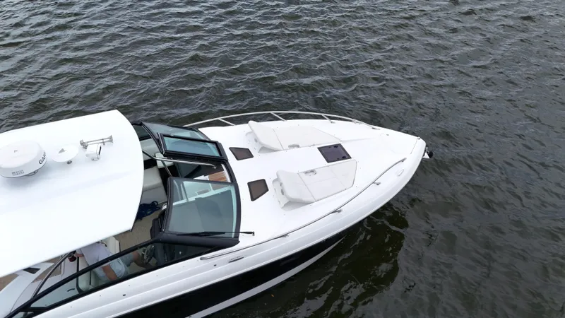  Yacht Photos Pics 2015 Cobalt A40 boat cruising on open water, top view.