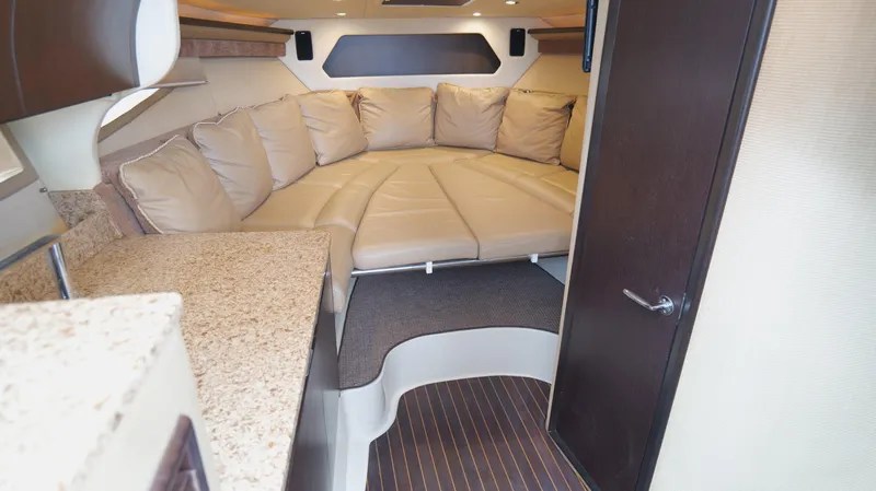  Yacht Photos Pics Luxurious interior of 2015 Cobalt A40 boat with plush seating and modern design.