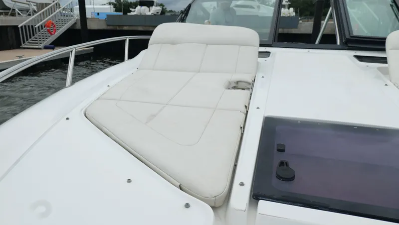  Yacht Photos Pics 2015 Cobalt A40 boat with white cushioned seating on deck.