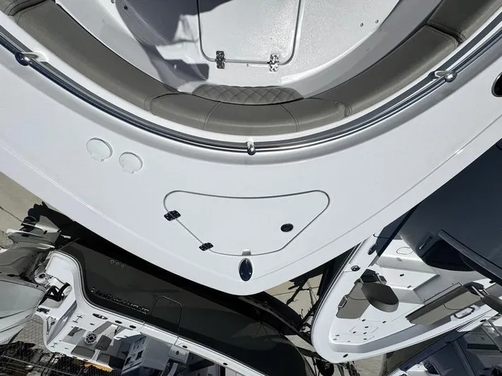  Yacht Photos Pics 2025 Sportsman Heritage 261 boat deck, featuring sleek design and modern amenities.