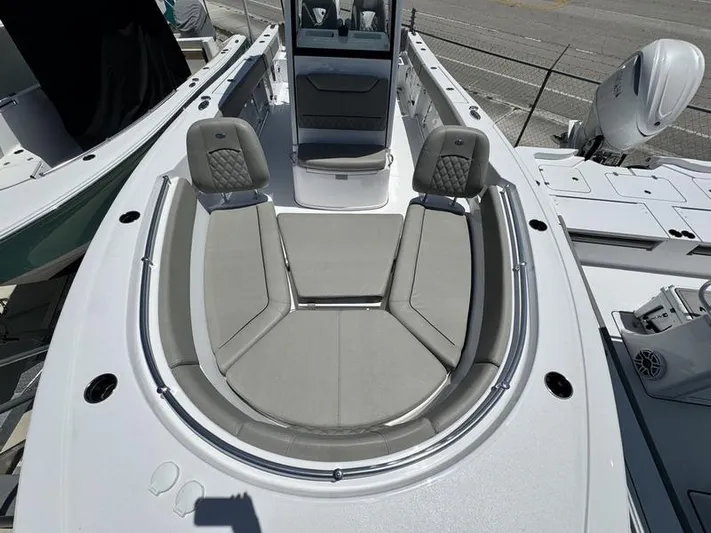  Yacht Photos Pics 2025 Sportsman Heritage 261 boat with spacious seating and modern design.