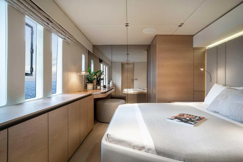  Yacht Photos Pics Luxurious bedroom interior of 2026 Sunreef 70 Sunreef Power yacht, featuring modern design and ocean view.