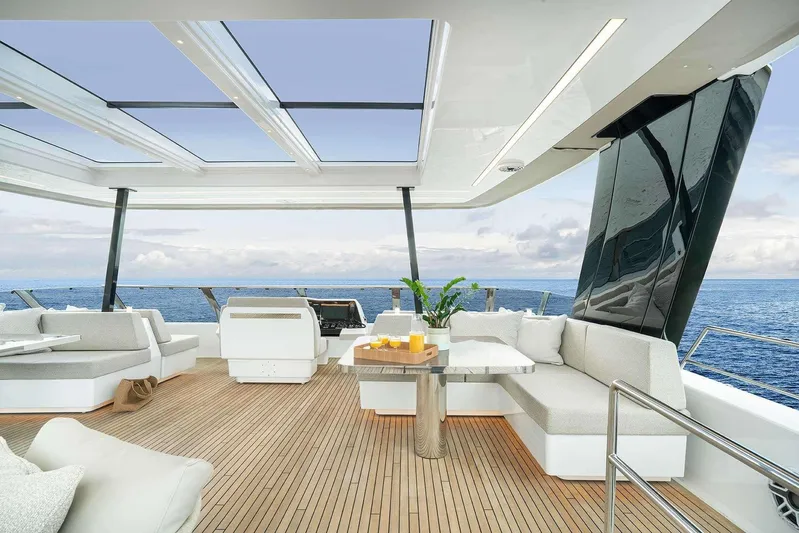  Yacht Photos Pics Luxurious 2026 Sunreef 70 Power yacht deck with modern seating and ocean view.