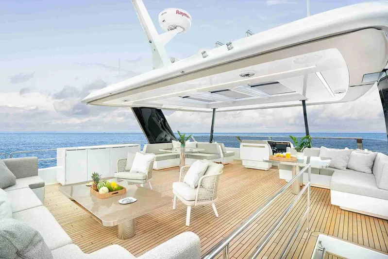  Yacht Photos Pics Luxurious 2026 Sunreef 70 Power yacht deck with elegant seating and ocean view.