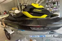 2014 Sea-Doo 260 RXT jet ski on trailer in a workshop setting.
