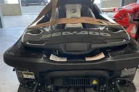 2014 Sea-Doo 260 RXT jet ski in garage, rear view with strap.