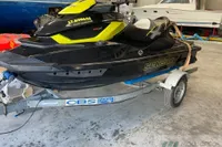 2014 Sea-Doo 260 RXT jet ski on trailer in a garage setting.