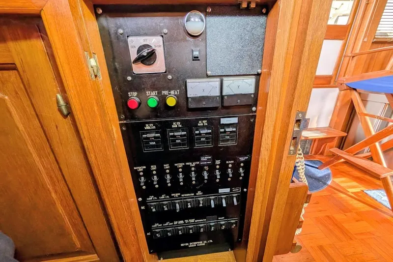 Positive Space Yacht Photos Pics Control panel of a 1987 DeFever Trawler with switches and gauges.