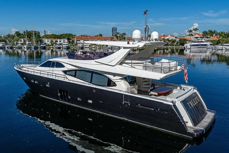 Twe11ve Yacht Photos Pics 2009 Ferretti Yachts 780 MY luxury yacht docked in a serene marina setting.