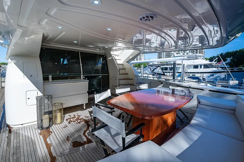 Twe11ve Yacht Photos Pics Luxurious 2009 Ferretti Yachts 780 MY deck with elegant seating and dining area.