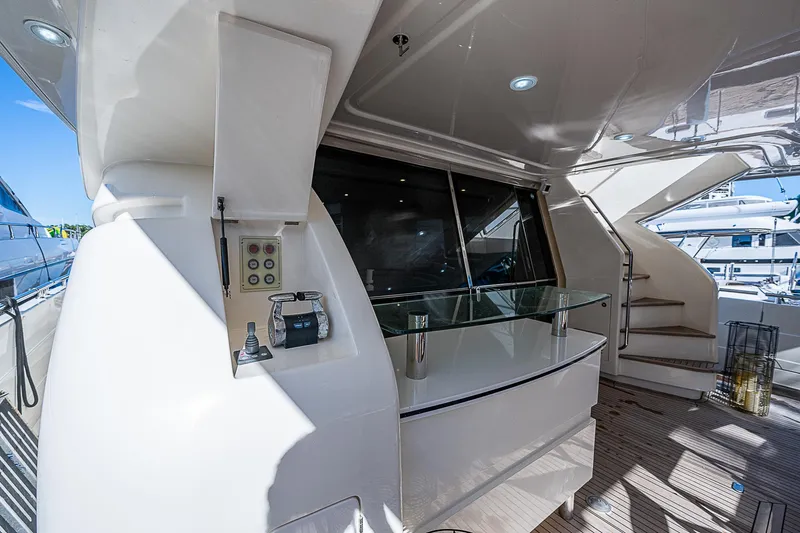 Twe11ve Yacht Photos Pics Luxurious 2009 Ferretti Yachts 780 MY deck with modern amenities and sleek design.