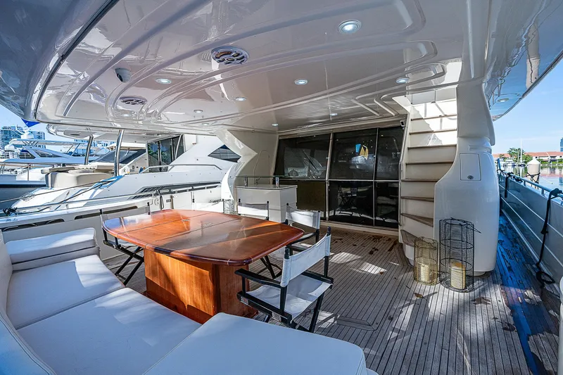 Twe11ve Yacht Photos Pics Luxurious 2009 Ferretti Yachts 780 MY deck with elegant seating and dining area.