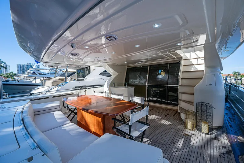 Twe11ve Yacht Photos Pics Luxurious 2009 Ferretti Yachts 780 MY with elegant outdoor seating and dining area.