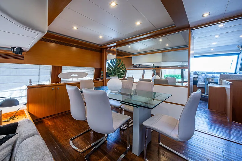 Twe11ve Yacht Photos Pics Luxurious interior of 2009 Ferretti Yachts 780 MY with elegant dining area.