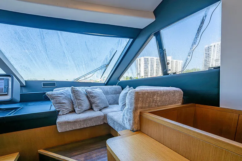 Twe11ve Yacht Photos Pics Luxurious interior of 2009 Ferretti Yachts 780 MY with plush seating and panoramic windows.