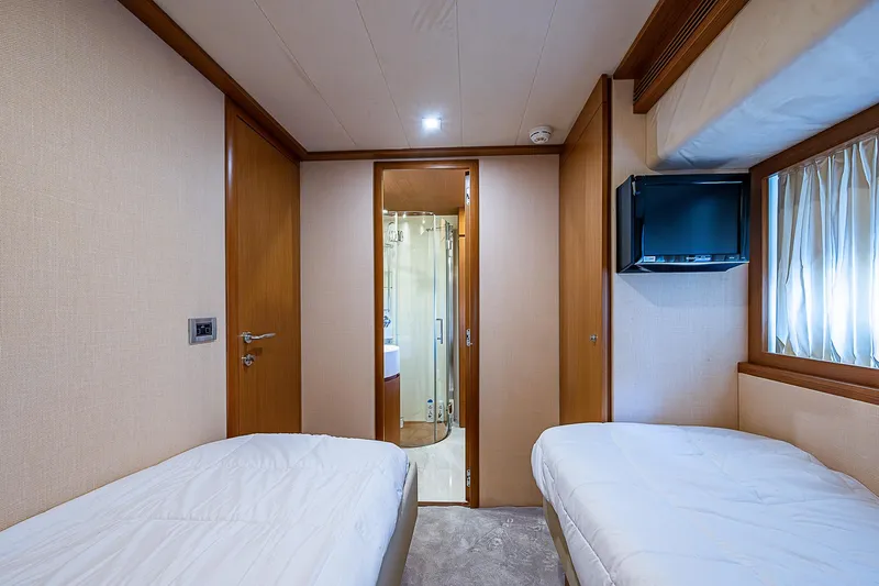 Twe11ve Yacht Photos Pics Interior of 2009 Ferretti Yachts 780 MY with twin beds and ensuite bathroom.