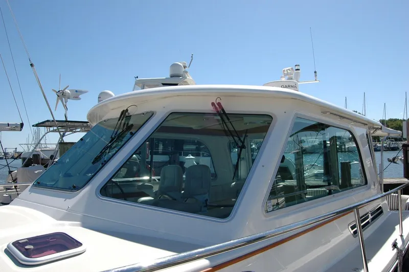 Double D Yacht Photos Pics 2014 Back Cove 37 yacht docked, showcasing sleek design and modern navigation equipment.