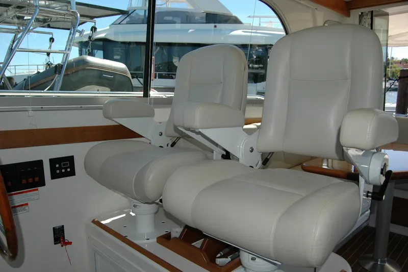 Double D Yacht Photos Pics Interior of 2014 Back Cove 37 yacht with two white captain's chairs.