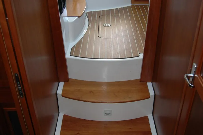 Double D Yacht Photos Pics Interior steps of a 2014 Back Cove 37 boat with wooden finish.