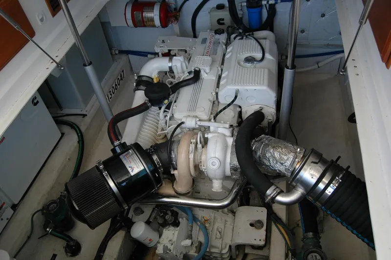 Double D Yacht Photos Pics Engine compartment of a 2014 Back Cove 37 boat, featuring detailed mechanical components.