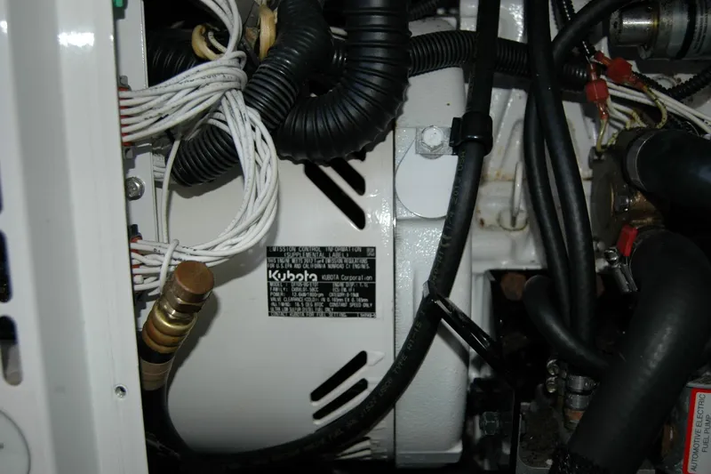 Double D Yacht Photos Pics Engine compartment of a 2014 Back Cove 37 boat featuring Kubota components.