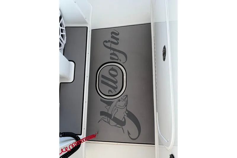  Yacht Photos Pics 2024 Yellowfin 36 Offshore boat deck with logo and fish graphic.