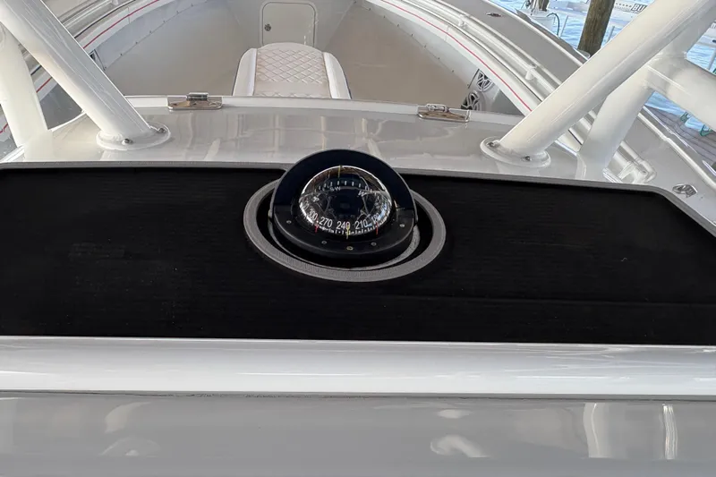  Yacht Photos Pics 2024 Yellowfin 36 Offshore boat compass and dashboard view.