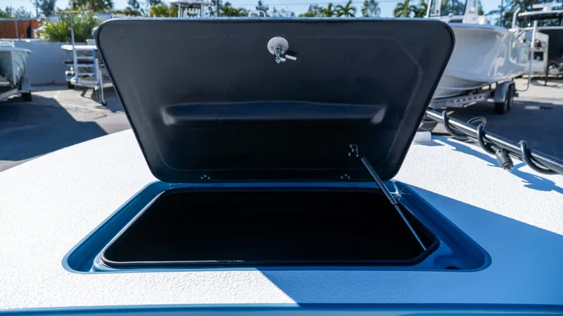  Yacht Photos Pics Open storage compartment on 2025 SCB S22 boat deck.