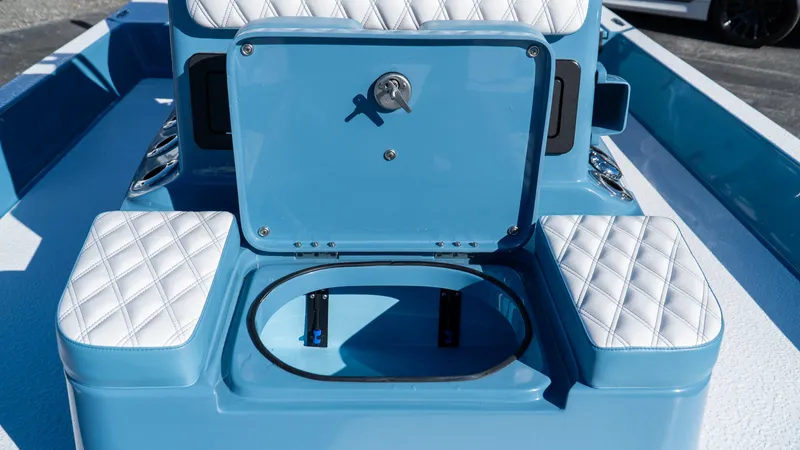  Yacht Photos Pics 2025 SCB S22 boat interior with blue and white quilted seating.